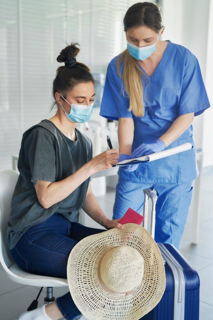 Woman signs documents before travel